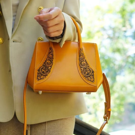 Whimsical Nature-inspired Leather Satchel