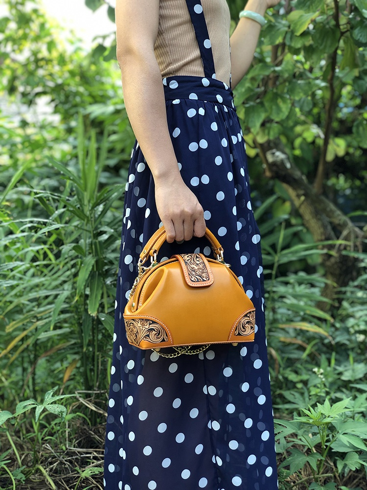 Exquisite Carved Leather Clutch