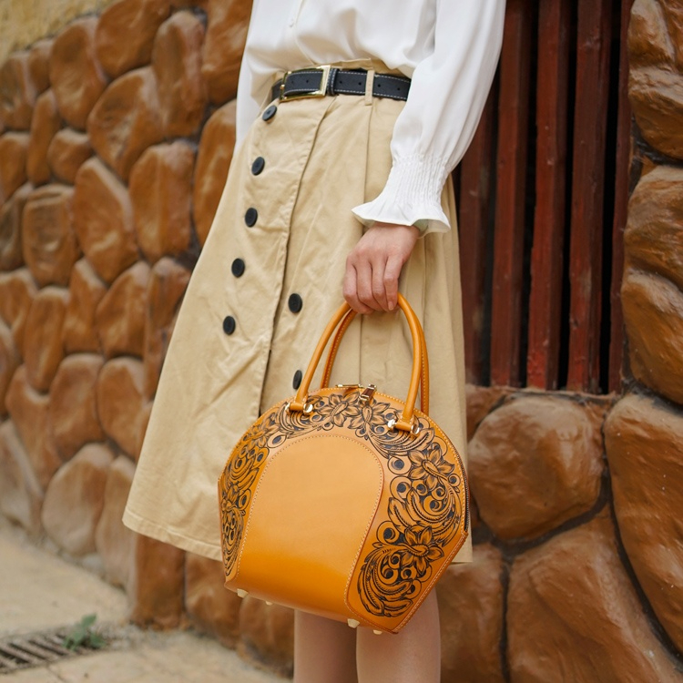 Vintage-inspired Carved Leather Crossbody