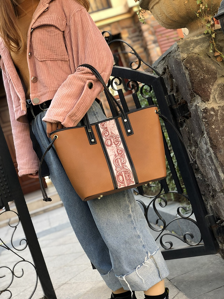 Artisan Carved Leather Tote with Nature Motifs