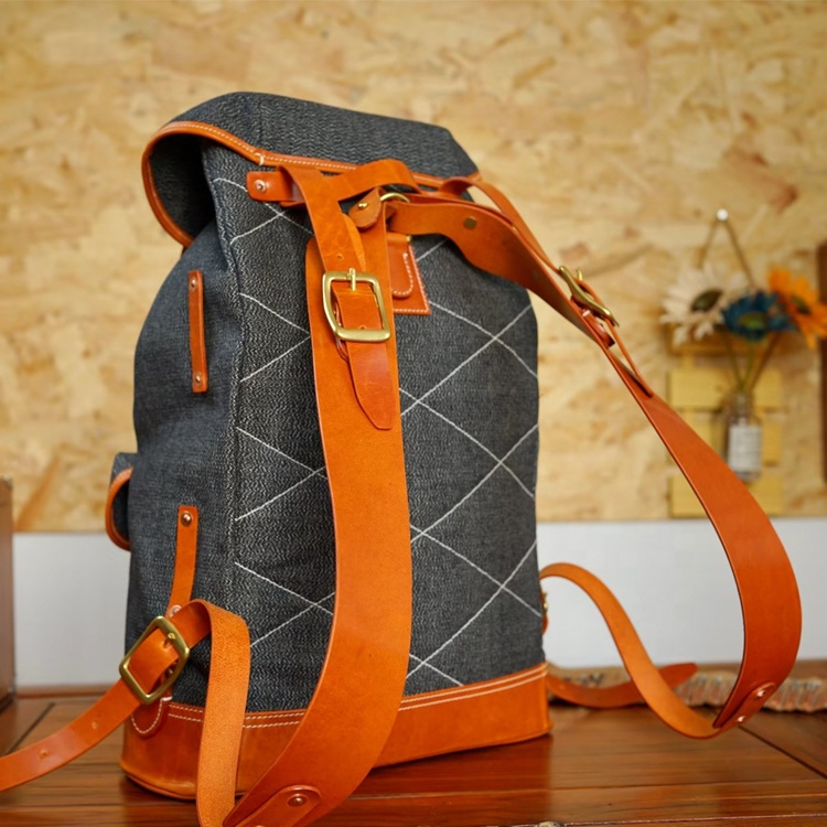 Contemporary Carved Leather Backpack with Nature Motifs