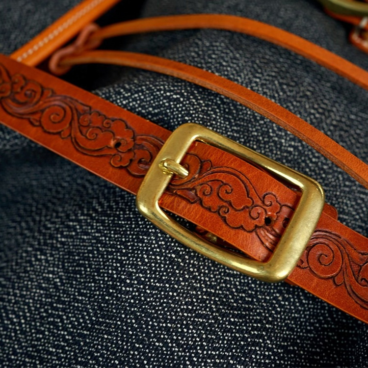 Contemporary Carved Leather Backpack with Nature Motifs