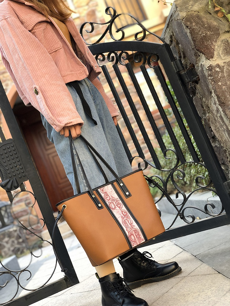 Artisan Carved Leather Tote with Nature Motifs