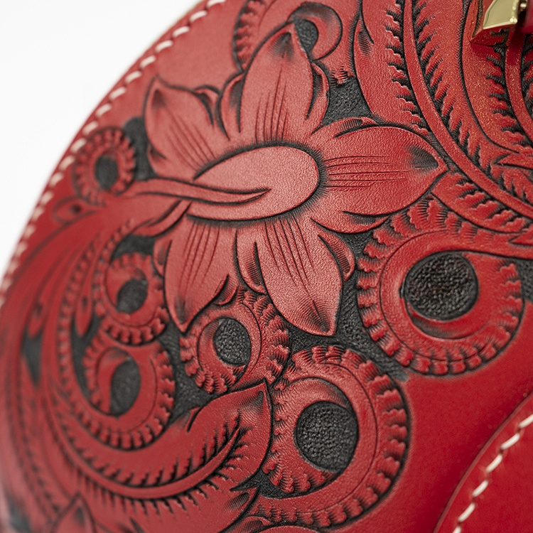 Vintage-inspired Carved Leather Crossbody