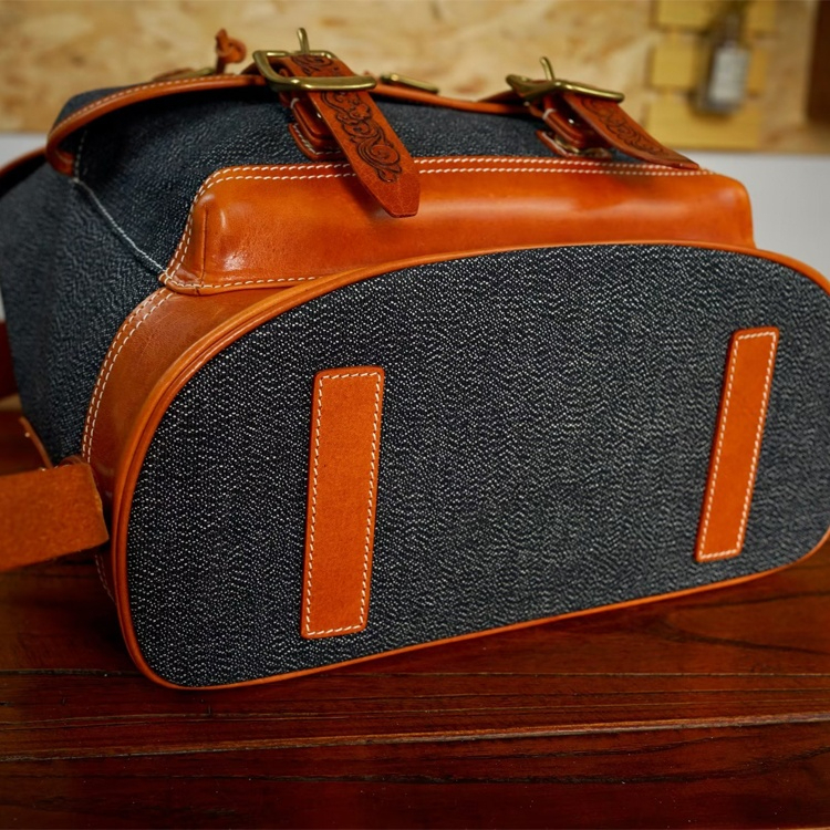 Contemporary Carved Leather Backpack with Nature Motifs