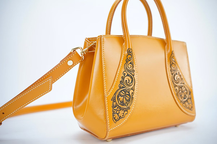 Whimsical Nature-inspired Leather Satchel
