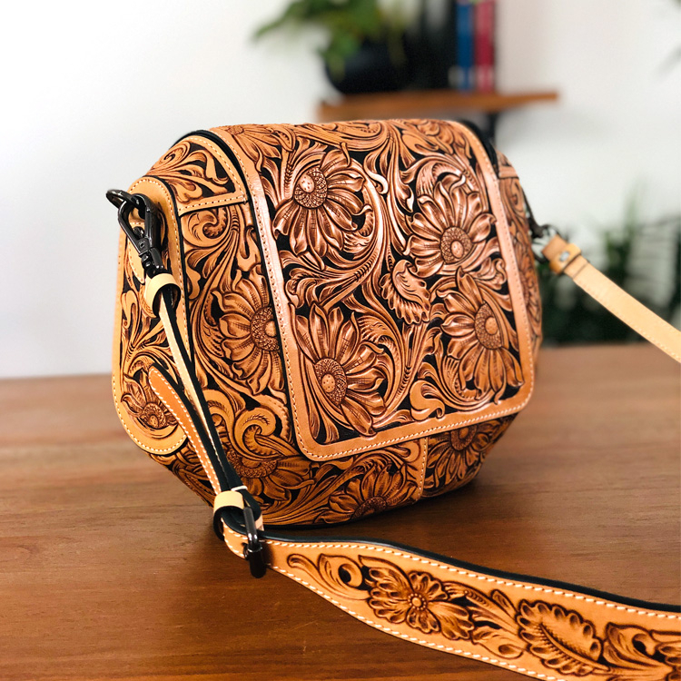 Handcrafted Leather Messenger with Intricate Carving